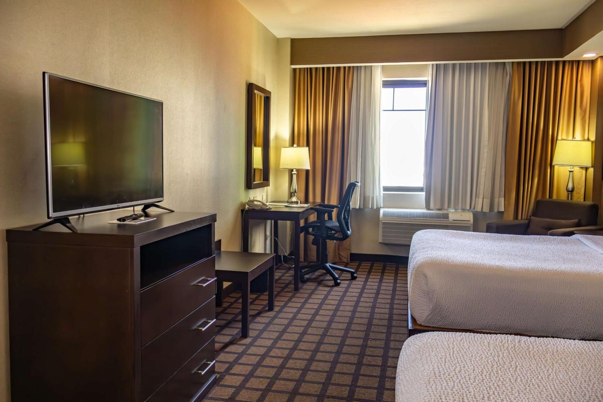 Best Western Premier Monterrey Aeropuerto Apodaca Eksteriør billede A typical room at the Hilton Garden Inn